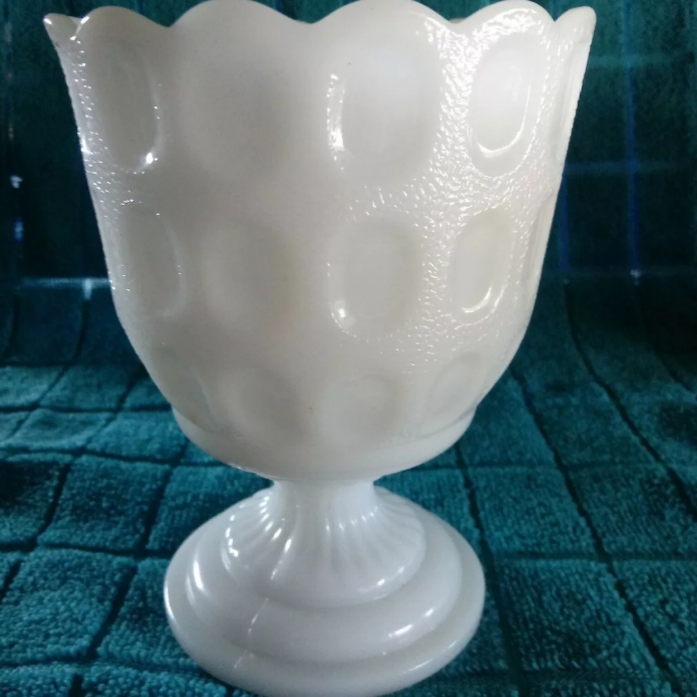 E.O. Brody milk glass pedestal thumbprint vase